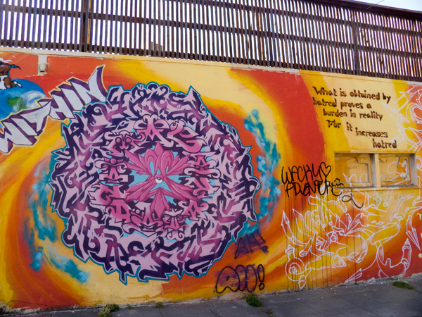 Oakland Mural on Broadway chaos within, peace without, oakland mural art