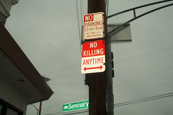 oakland graffiti, no killing signs, modified parking signs