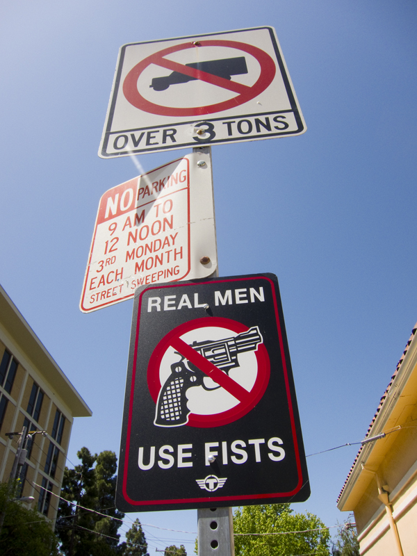 trustocorp, trustocorp street sign, trustocorp graffiti