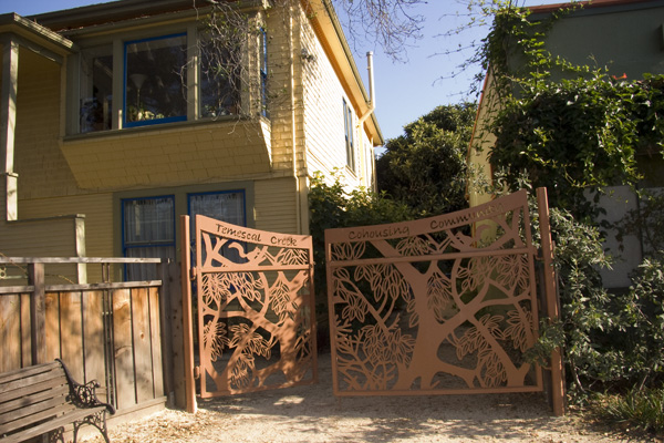 temescal creek cohousing community, metal sculpture gate