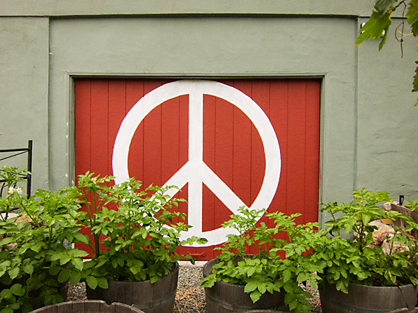 Painted peace sign on garage, peace signs oakland