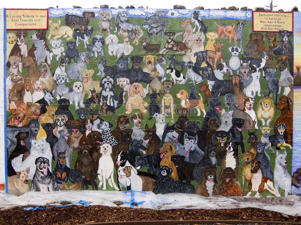 man's best friend, oakland murals, jingle town mural, mural of dogs