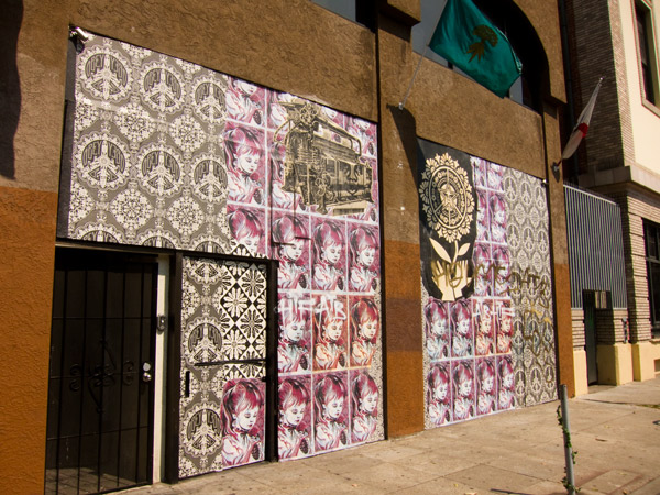 Sheppard Fairey Wheatpaste Installation Oakland wheatpaste mural 15th street, obey giant mural oakland